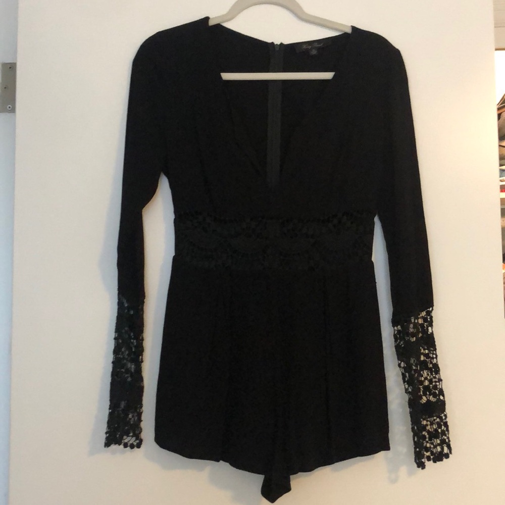 Long sleeve black romper with lace detail